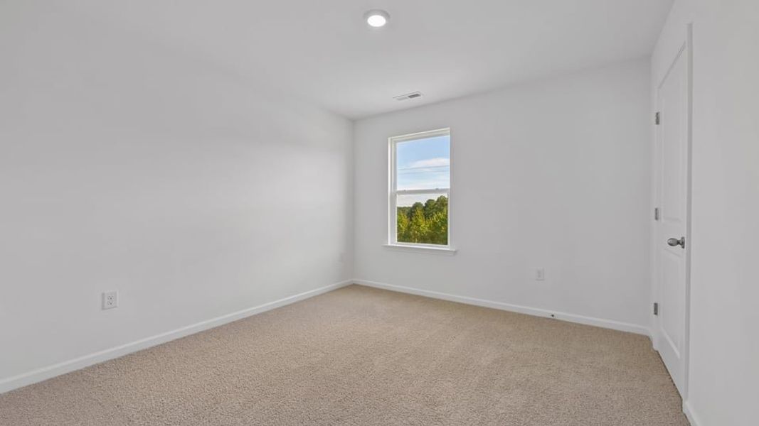 Spacious, unfurnished interior of a new home in Mason Ridge, Spring Lake (Image 29).