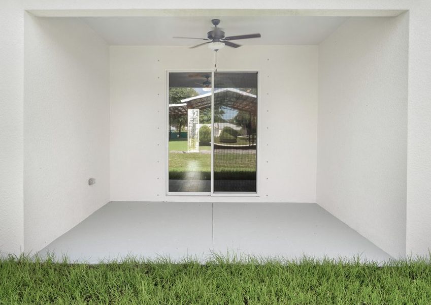 The backyard includes a covered patio!
