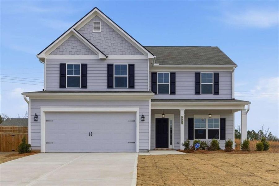 Front exterior of a new home in The Reserve at Chapel Hill Phase II, Douglasville, GA, highlighting curb appeal (Image 1). Front exterior of a new home in The Reserve at Chapel Hill Phase II, Douglasville, GA, highlighting curb appeal (Image 1).