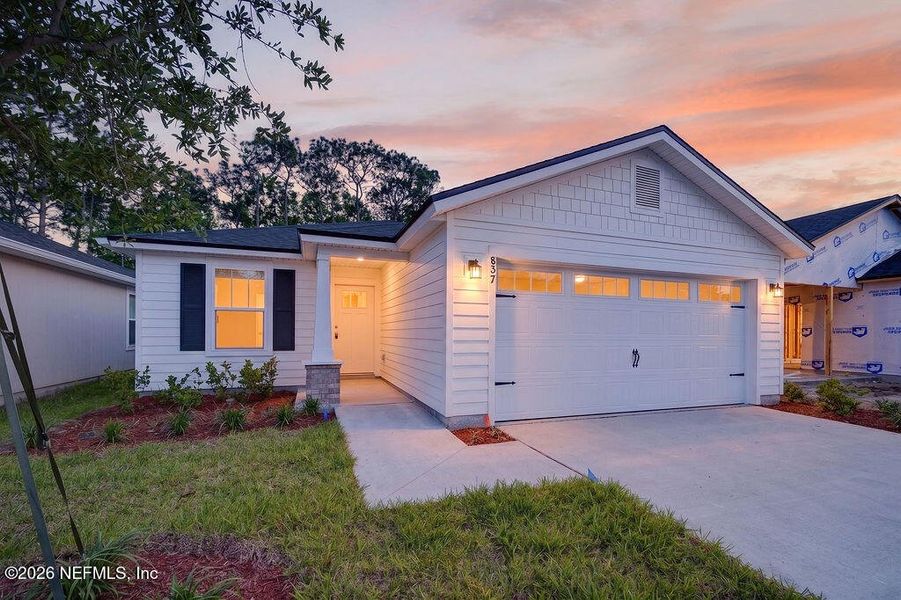 Front exterior of a new home in , Jacksonville, FL, highlighting curb appeal (Image 22).