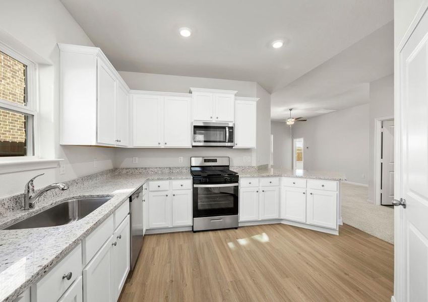 The kitchen comes with a full suite of stainless steel appliances!