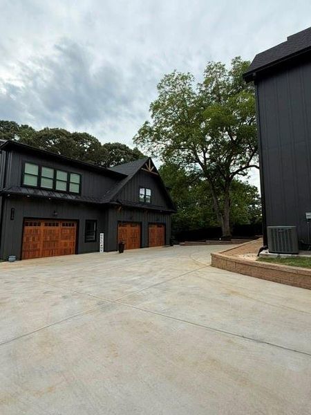 Front exterior of a new home in , Buford, GA, highlighting curb appeal (Image 29). Front exterior of a new home in , Buford, GA, highlighting curb appeal (Image 29).