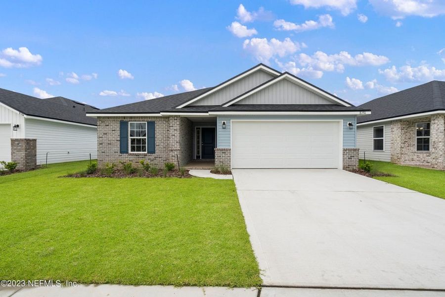 Representative exterior photo of a completed home built from the 1635- B by Adams Homes in Aviary at Rutland Ranch, Parrish, FL (Image 15). Representative exterior photo of a completed home built from the 1635- B by Adams Homes in Aviary at Rutland Ranch, Parrish, FL (Image 15).