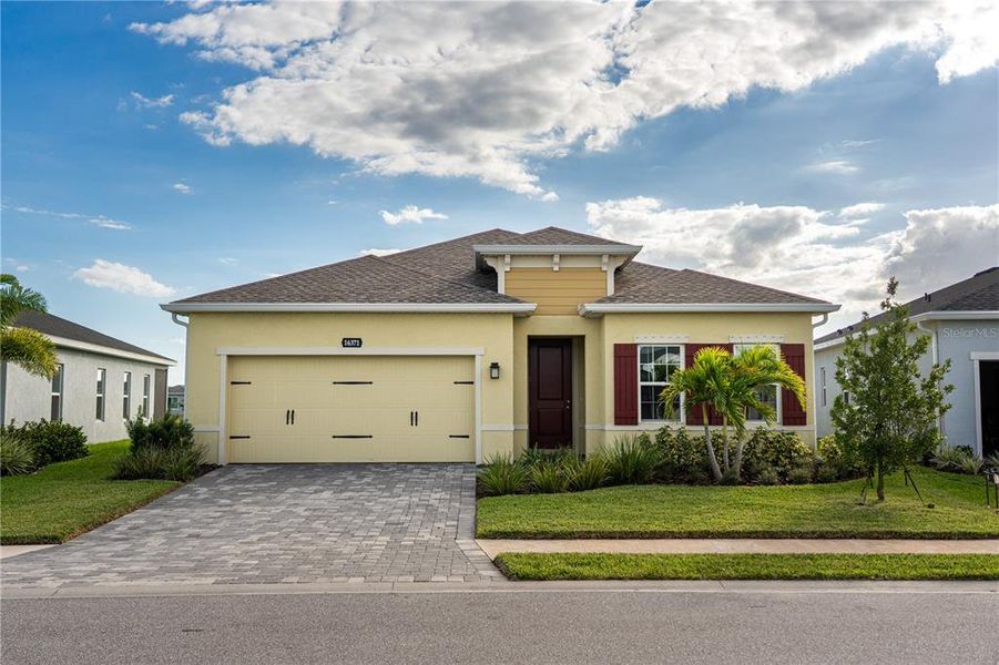 Front exterior of a new home in , Port Charlotte, FL, highlighting curb appeal (Image 1). Front exterior of a new home in , Port Charlotte, FL, highlighting curb appeal (Image 1).
