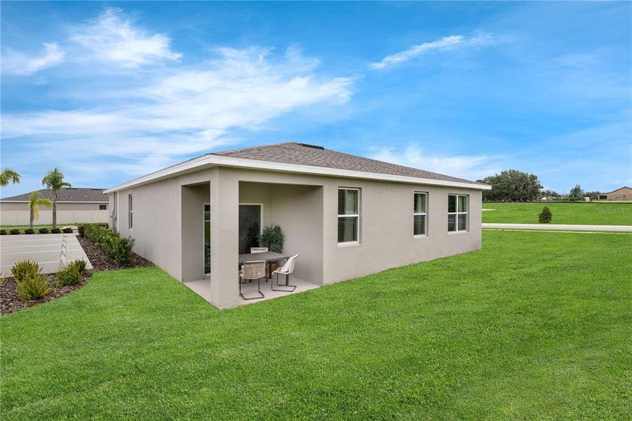 Exterior details and patio area of a home in Hidden Cove, Eustis (Image 3).