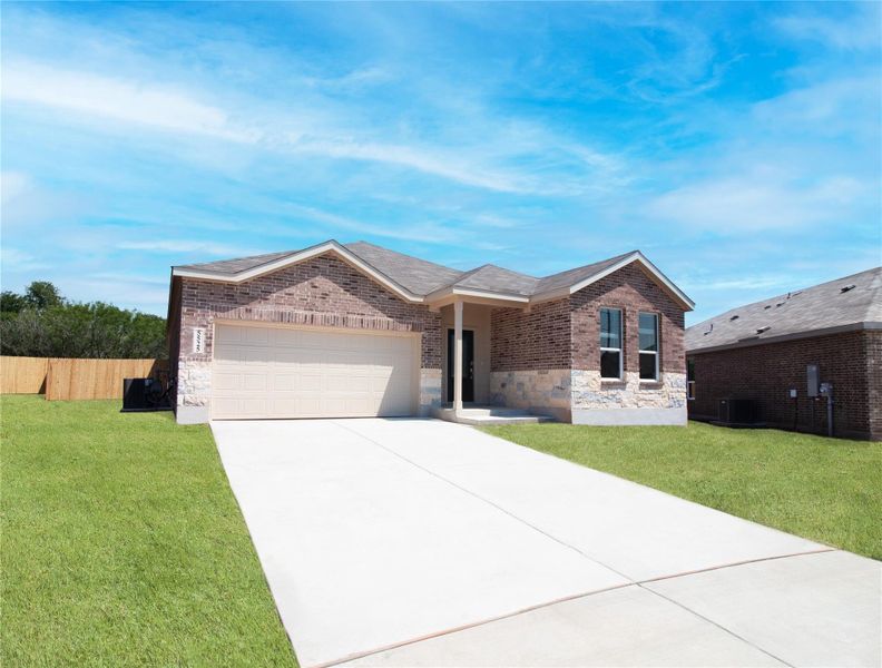 Front exterior of a new home in Windrose Green, Angleton, TX, highlighting curb appeal (Image 22).