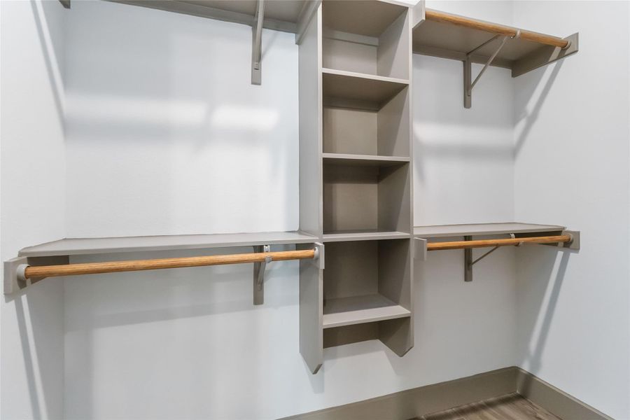 Primary closet with built-in shelving