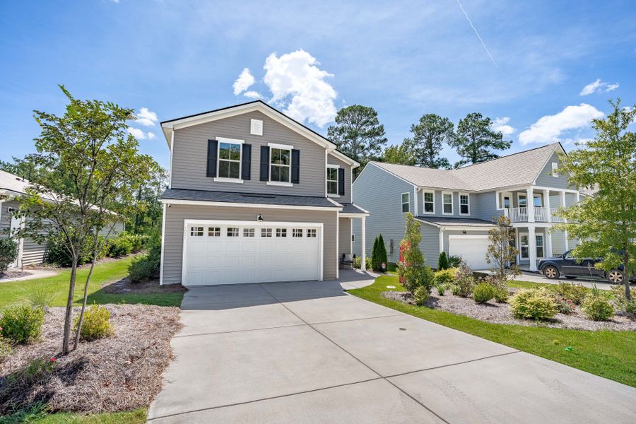 Front exterior of a new home in Grand Arbor, Blythewood, SC, highlighting curb appeal (Image 25).