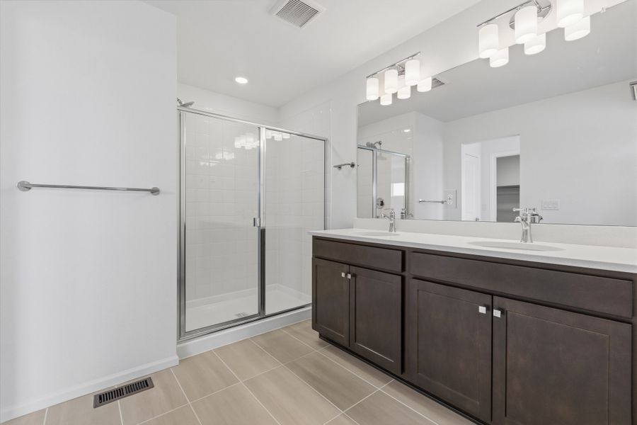 Furnished interior view inside a new home in Woodrose at Painted Prairie, Aurora (Image 8).
