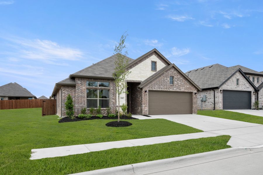 Front exterior of a new home in Summer Crest, Fort Worth, TX, highlighting curb appeal (Image 2). Front exterior of a new home in Summer Crest, Fort Worth, TX, highlighting curb appeal (Image 2).