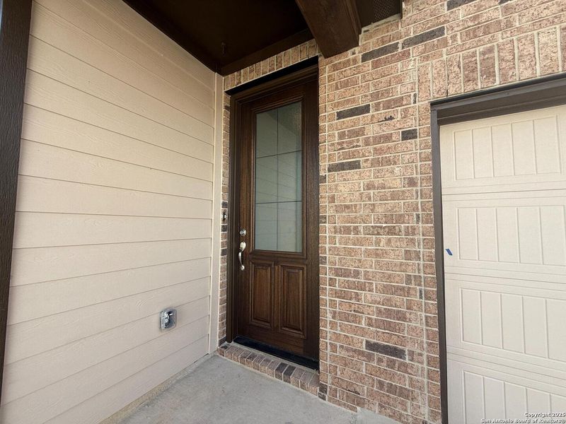 Exterior details and patio area of a home in The Summit at Saddlebrook Ranch 55's, Schertz (Image 2).