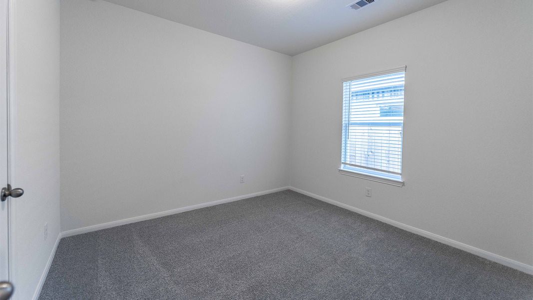Spacious, unfurnished interior of a new home in The Canopies, Splendora (Image 18).