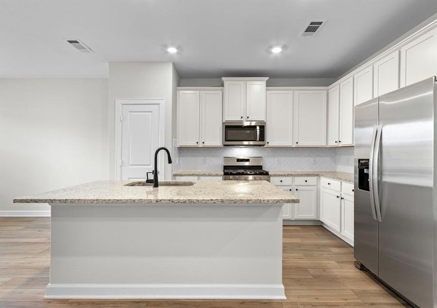 Enjoy cooking on gorgeous countertops.