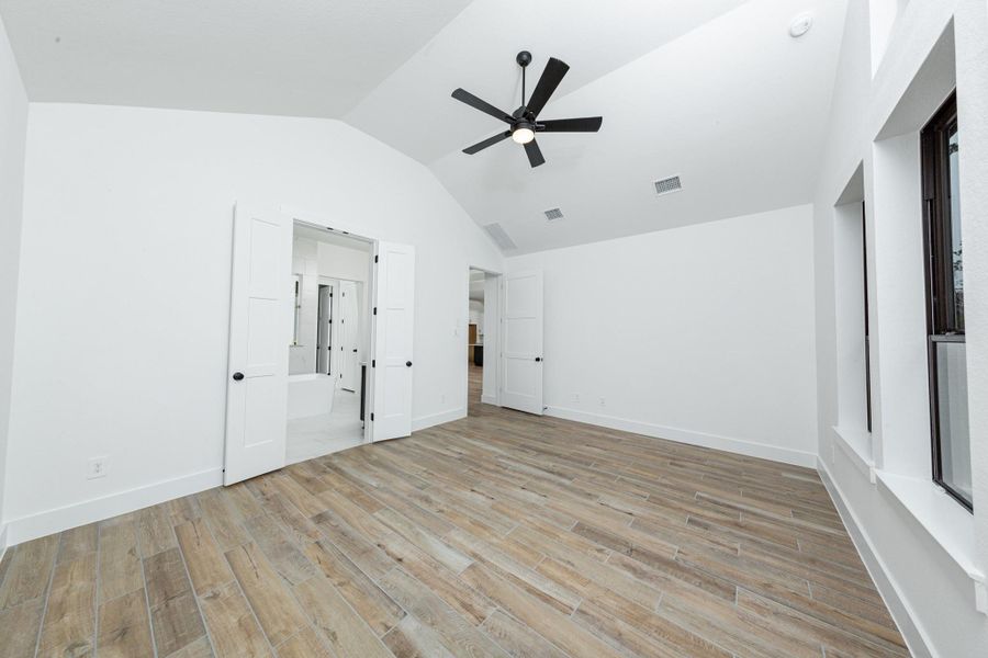 Additional view from primary bedroom looking towards the double door entrance to primary ensuite bathroom.
