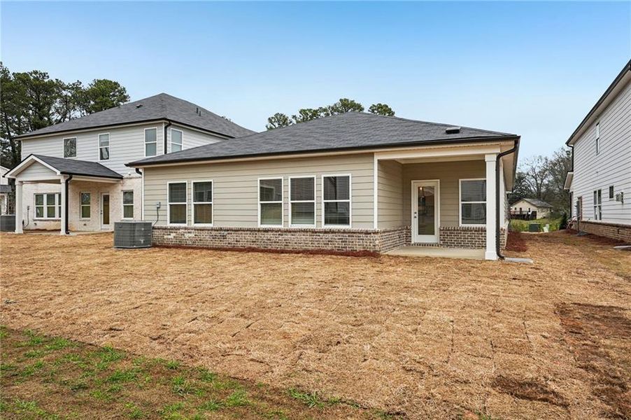 Exterior details and patio area of a home in Westmont Preserve, Powder Springs (Image 34). Exterior details and patio area of a home in Westmont Preserve, Powder Springs (Image 34).