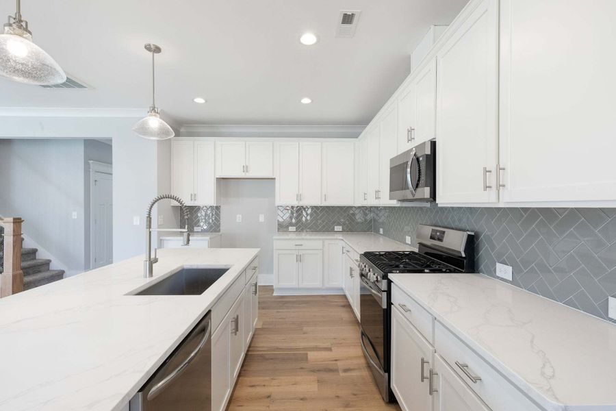 Representative furnished interior of a home built from the Austin by Caviness & Cates Communities in Bartlett Manor, Youngsville (Image 113).