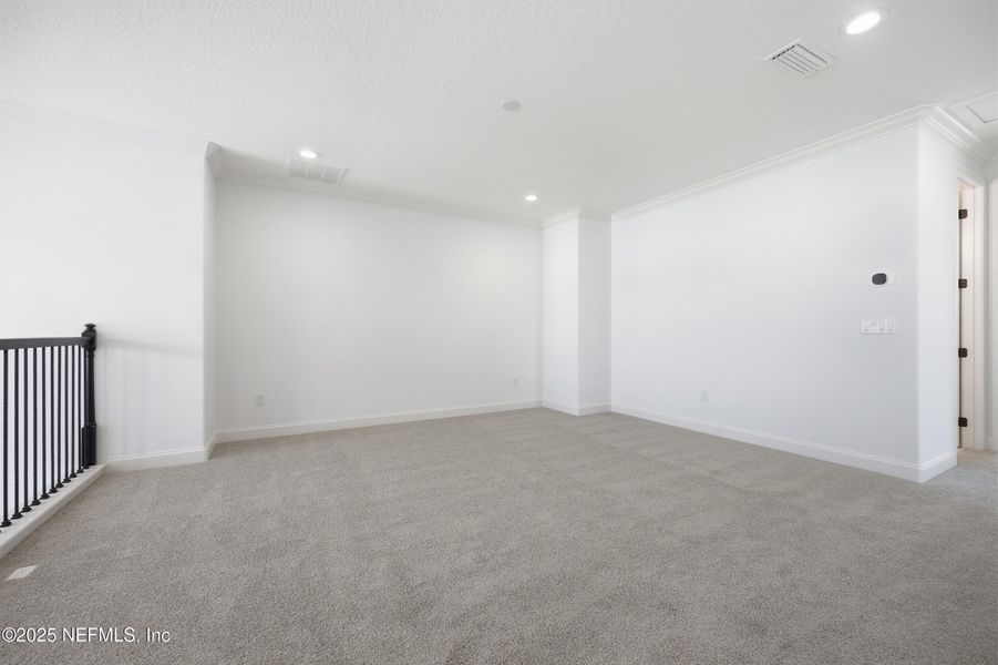 Spacious, unfurnished interior of a new home in Silver Landing At Silverleaf, St. Augustine (Image 27).