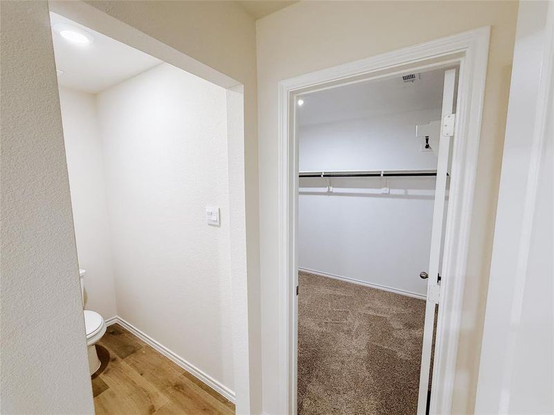 Primary Bedroom Walk in closet