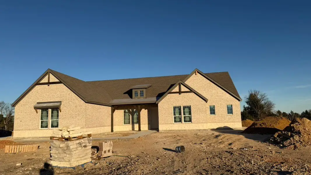 In-progress construction of a new home in Grayson Ridge, Van Alstyne, TX (Image 3).