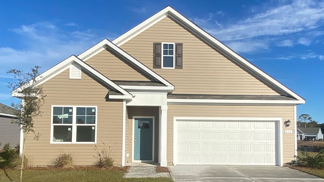 Front exterior of a new home in Stanbury Creek, Supply, NC, highlighting curb appeal (Image 1).
