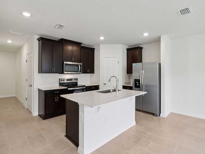 Furnished interior view inside a new home in Cagan Crossings West, Clermont (Image 4).