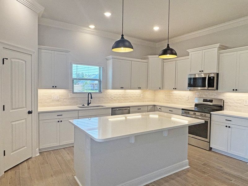 Furnished interior view inside a new home in Bird Song at Hammock Bay, Freeport (Image 8).