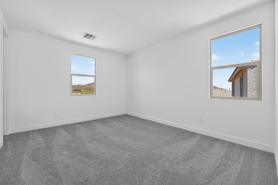 Spacious, unfurnished interior of a new home in Ladera Trails, Queen Creek (Image 18).