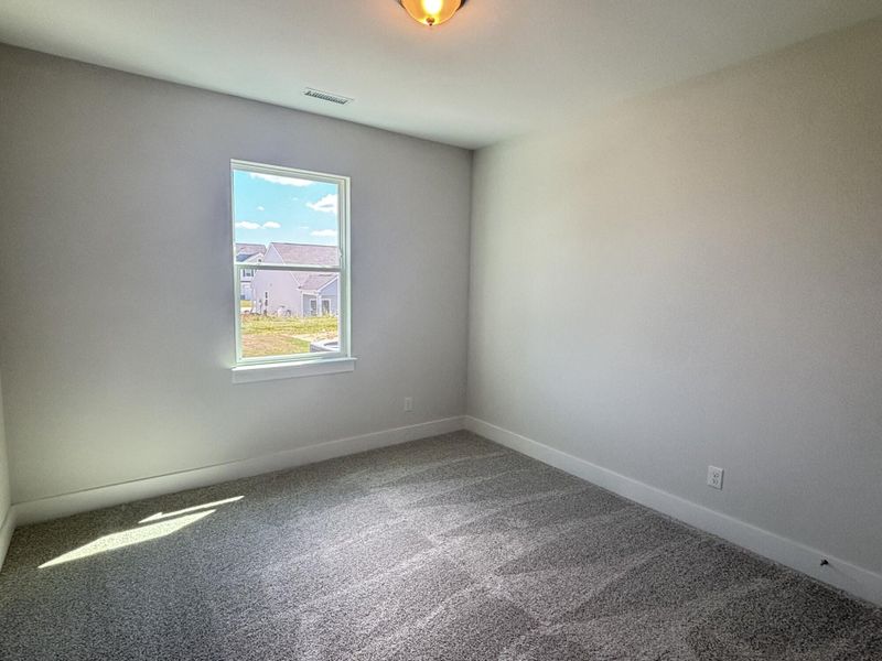 Spacious, unfurnished interior of a new home in Daniel Farms, Benson (Image 25).