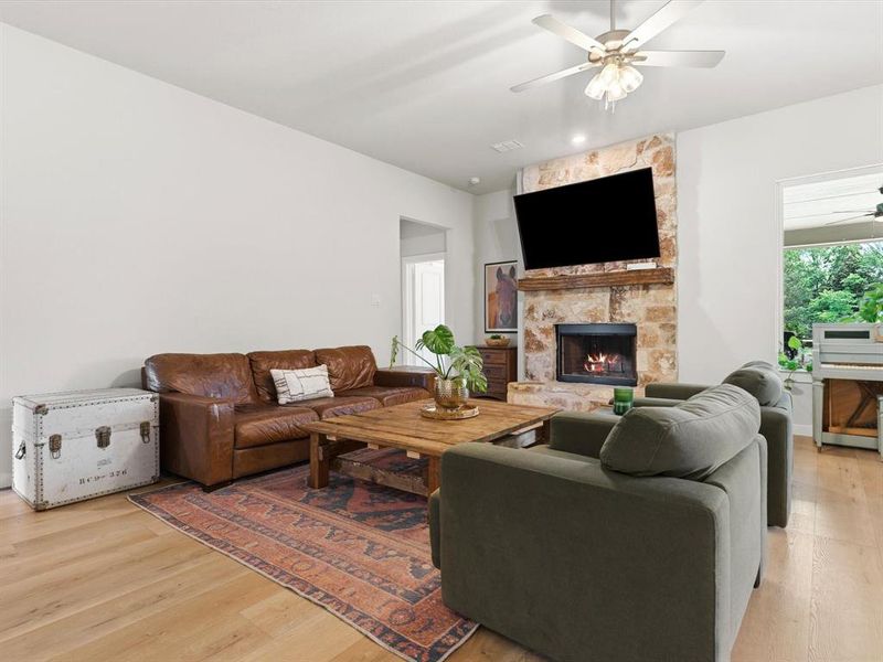 Open-concept living room with abundant natural light, ideal for entertaining and everyday living.