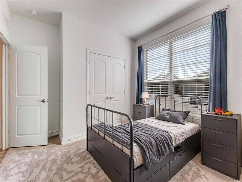 Furnished interior view inside a new home in Woodcreek, Fate (Image 17).