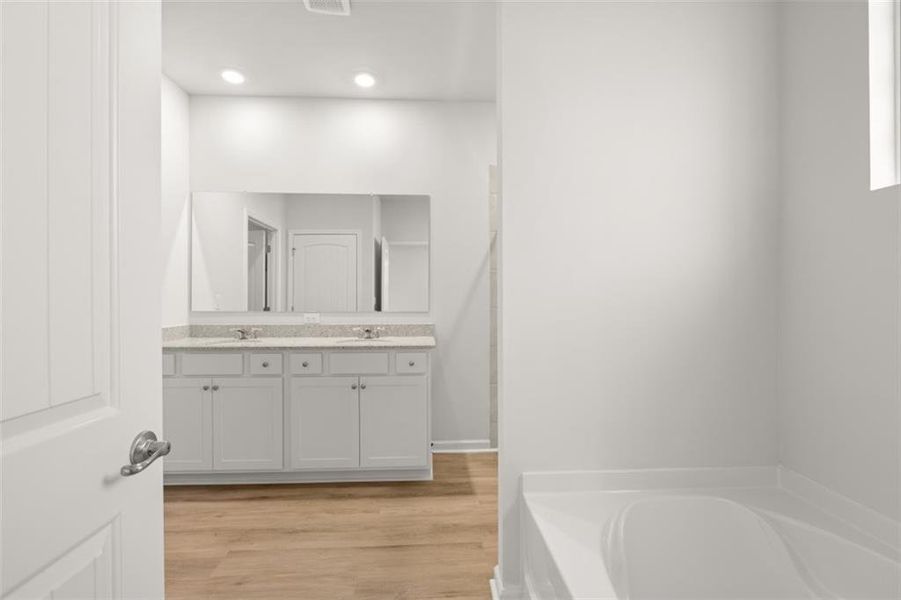 Furnished interior view inside a new home in Fairway 17 at Mirror Lake, Villa Rica (Image 6).