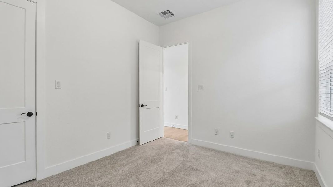 Spacious, unfurnished interior of a new home in The Woodland Hills 50', Willis (Image 26). Spacious, unfurnished interior of a new home in The Woodland Hills 50', Willis (Image 26).