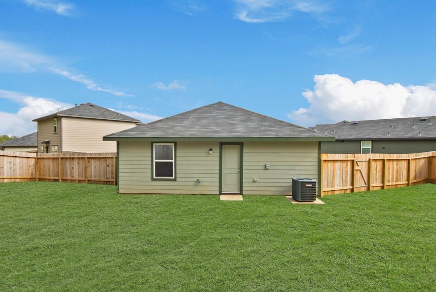 Exterior details and patio area of a home in McCrorey Trails, Conroe (Image 3).