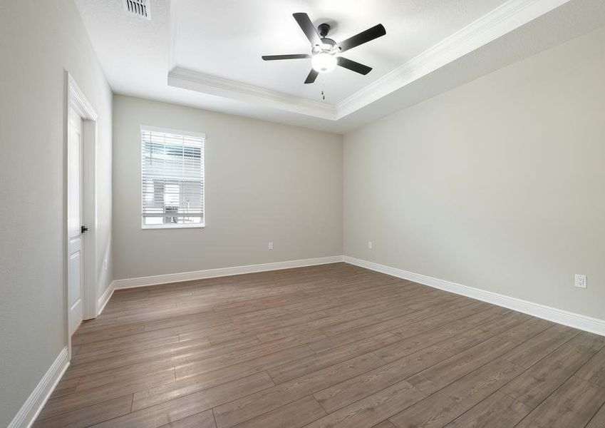 A downstairs masters bedroom with its own bathroom and walk-in closet.