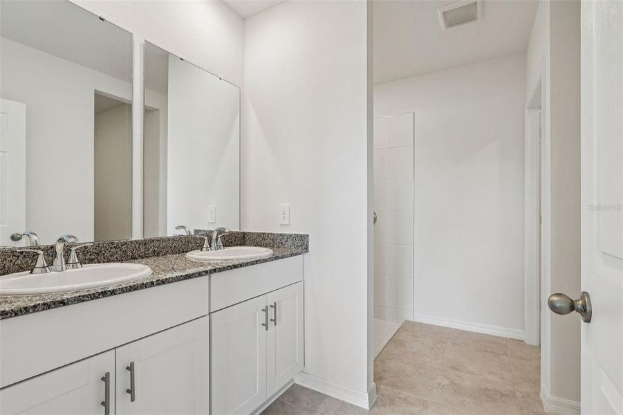 Furnished interior view inside a new home in Bradbury Creek - Classic Series, Haines City (Image 6).