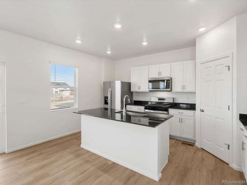 Furnished interior view inside a new home in Westgate, Greeley (Image 9).