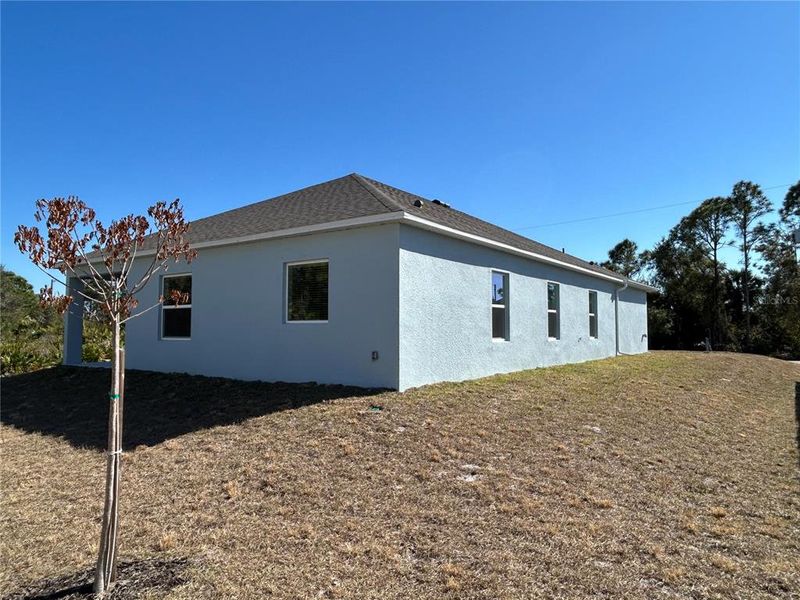 Exterior details and patio area of a home in Port Charlotte, Port Charlotte (Image 4).