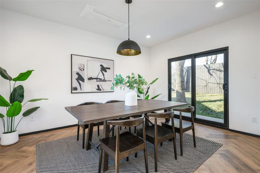 Dining room with baseboards and recessed lighting Dining room with baseboards and recessed lighting