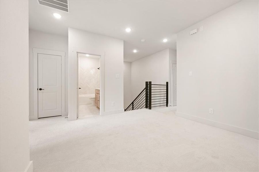 The upstairs loft area is the perfect second family living space.