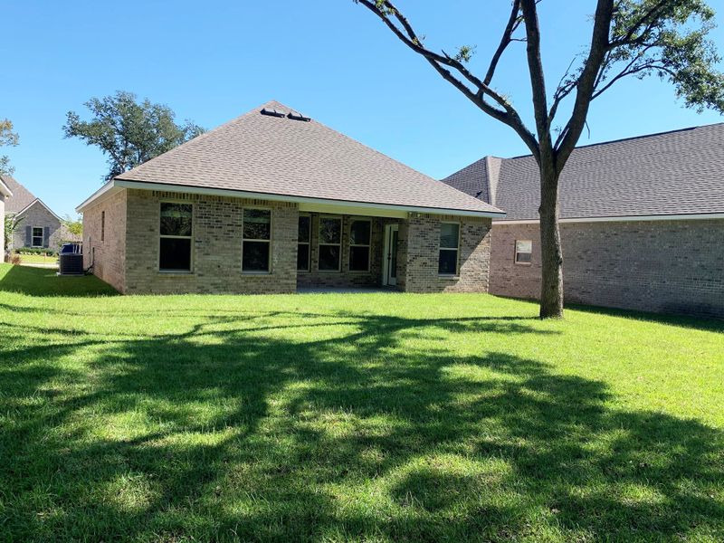 Exterior details and patio area of a home in Sentinel Ridge, Pace (Image 2).