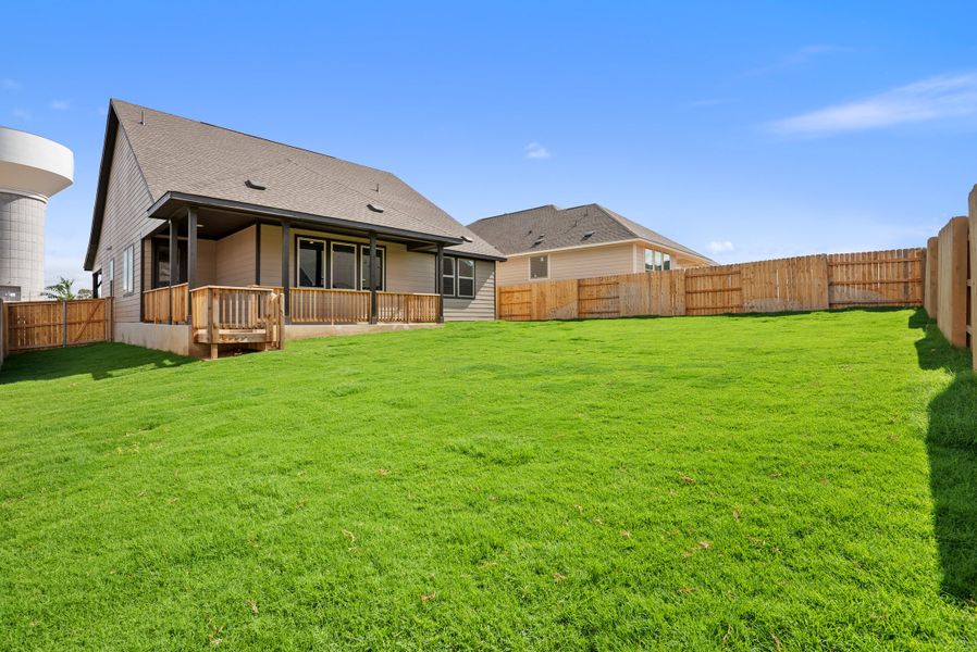 Representative exterior photo of a completed home built from the Texoma by Ashton Woods in The Colony 50s, Bastrop, TX (Image 22).