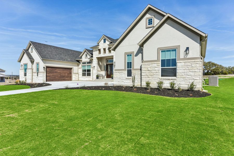 Front exterior of a new home in Feathergrass, Florence, TX, highlighting curb appeal (Image 28).