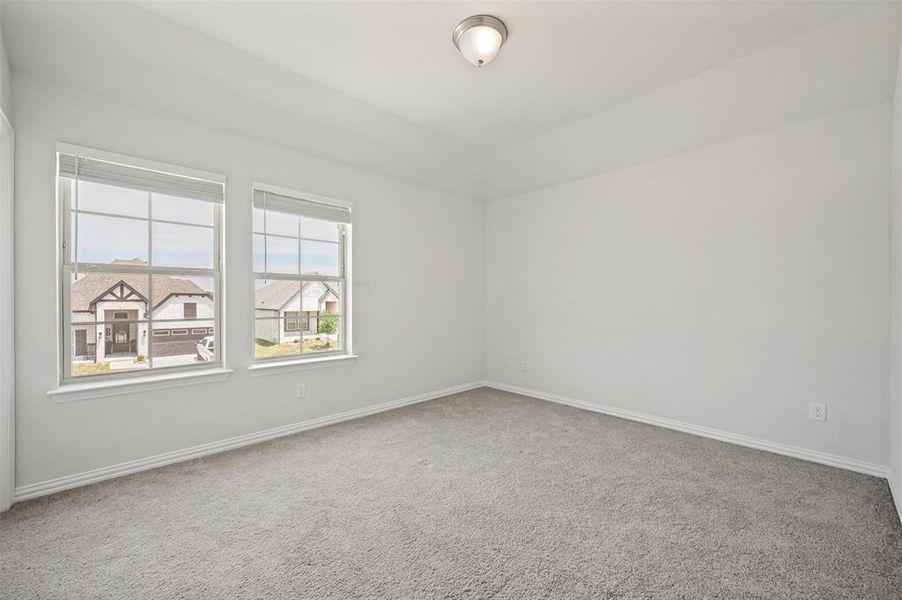 Spacious, unfurnished interior of a new home in The Villages of Hurricane Creek, Anna (Image 25).