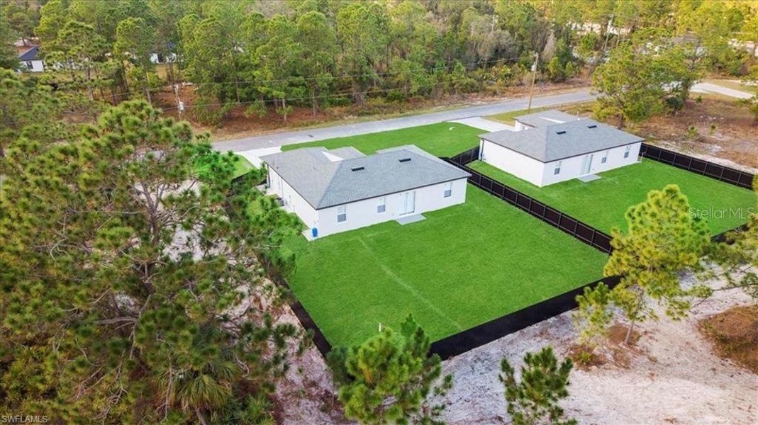 Front exterior of a new home in , Lehigh Acres, FL, highlighting curb appeal (Image 25).