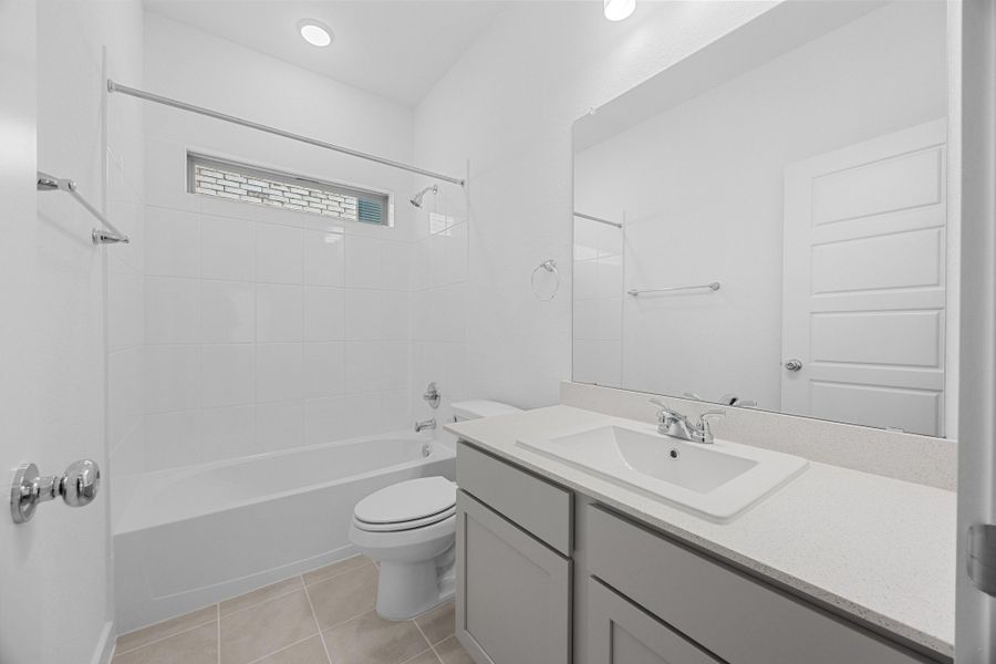 Bathroom in the Pecan II home plan by Trophy Signature Homes – REPRESENTATIVE PHOTO Bathroom in the Pecan II home plan by Trophy Signature Homes – REPRESENTATIVE PHOTO