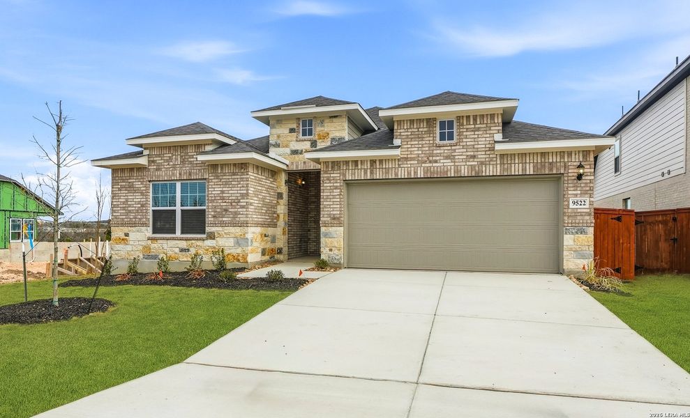 Front exterior of a new home in Stillwater Ranch, San Antonio, TX, highlighting curb appeal (Image 21).