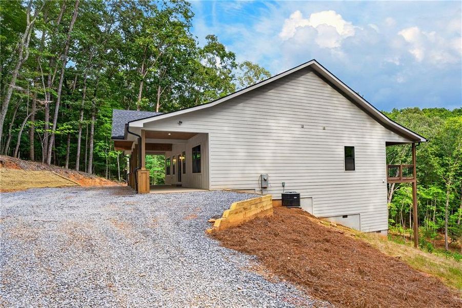 Exterior details and patio area of a home in , Ellijay (Image 33).