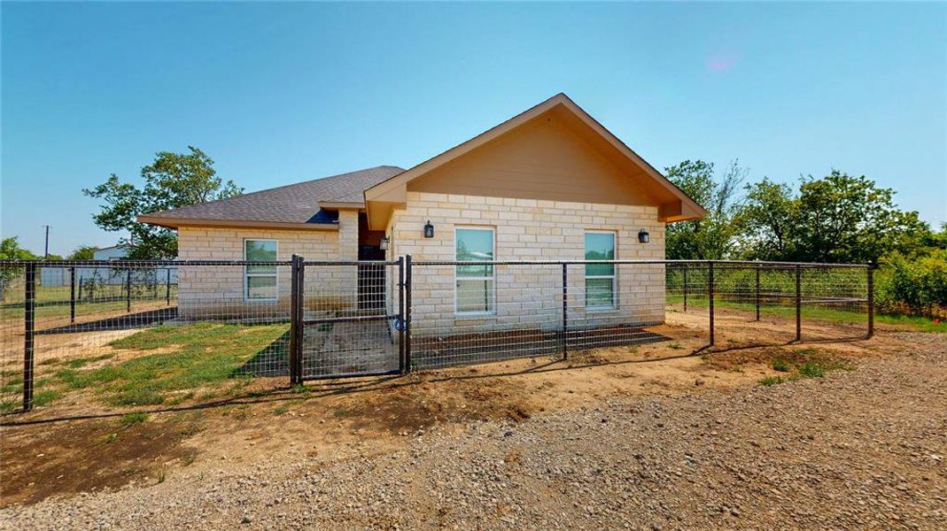 Front exterior of a new home in , Justin, TX, highlighting curb appeal (Image 2).