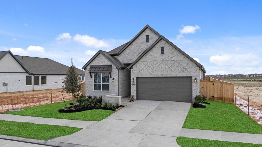 Front exterior of a new home in Bridgeland, Cypress, TX, highlighting curb appeal (Image 17).