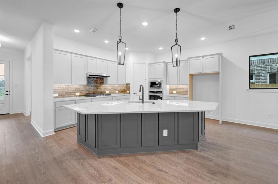 Furnished interior view inside a new home in Riceland 50’ Alley Load Homesites, Mont Belvieu (Image 13).